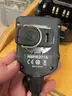 Eight Motorola Impres WPLN4114AR battery chargers with additional accessories