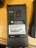 Eight Motorola Impres WPLN4114AR battery chargers with additional accessories