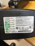 Eight Motorola Impres WPLN4114AR battery chargers with additional accessories