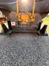 Garbage can tipper