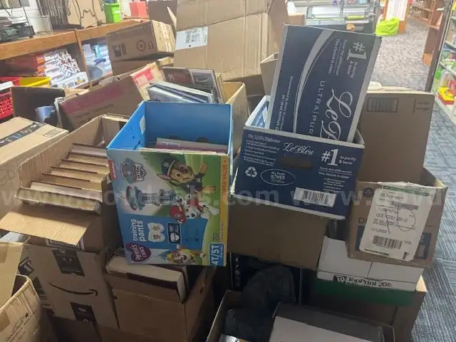 Over 20 boxes of discarded books from our elementary school library