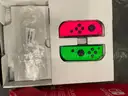 Nintendo Switch bundle with extra Joycon and games