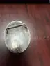 Silver belt buckles, silver spoons and ring