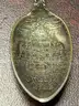 Silver belt buckles, silver spoons and ring