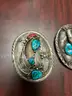 Silver belt buckles, silver spoons and ring