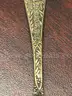 Silver belt buckles, silver spoons and ring
