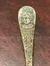 Silver belt buckles, silver spoons and ring