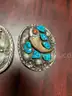 Silver belt buckles, silver spoons and ring
