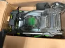 EGO push mower, chainsaw, weed trimmer, batteries and charging stations combo