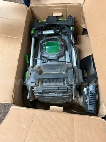 EGO push mower, chainsaw, weed trimmer, batteries and charging stations combo