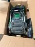EGO push mower, chainsaw, weed trimmer, batteries and charging stations combo