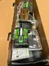 EGO push mower, chainsaw, weed trimmer, batteries and charging stations combo