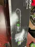 EGO push mower, chainsaw, weed trimmer, batteries and charging stations combo