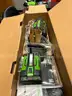 EGO push mower, chainsaw, weed trimmer, batteries and charging stations combo