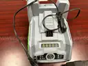 EGO push mower, chainsaw, weed trimmer, batteries and charging stations combo