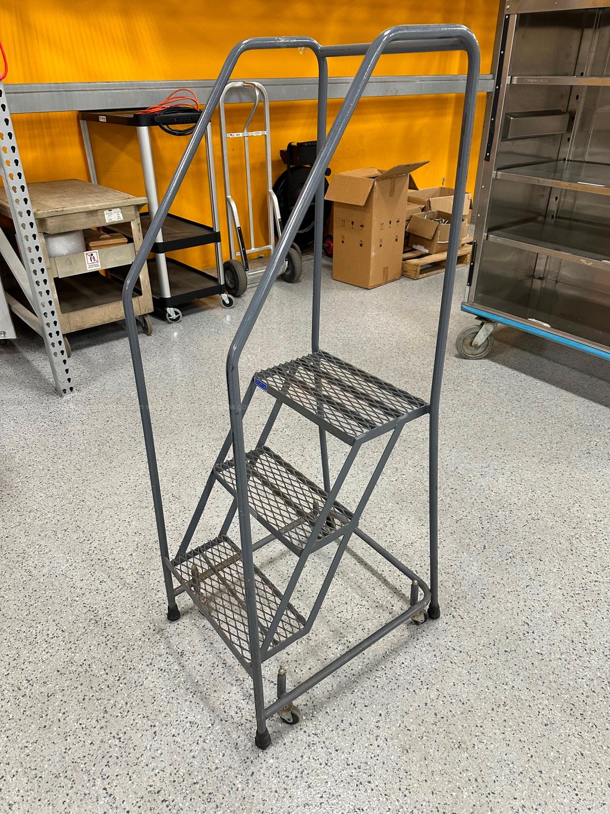 Rolling Metal Step Ladder | AllSurplus