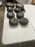 Lot of miscellaneous yard type tires and a box of casters