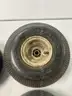 Lot of miscellaneous yard type tires and a box of casters