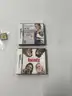 2 Nintendo 2ds and 4 games