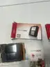 2 Nintendo 2ds and 4 games