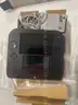 2 Nintendo 2ds and 4 games