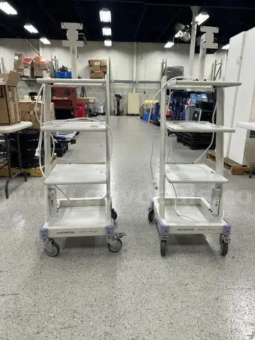 2 Olympus Compact Trolley Carts