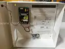 2 Assa Abloy Securitron AQD1 Power Supplies and 1 Schlage PS902 Enclosure