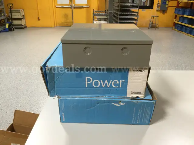 2 Assa Abloy Securitron AQD1 Power Supplies and 1 Schlage PS902 Enclosure