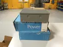 2 Assa Abloy Securitron AQD1 Power Supplies and 1 Schlage PS902 Enclosure