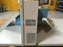2 Assa Abloy Securitron AQD1 Power Supplies and 1 Schlage PS902 Enclosure