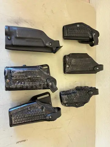 GUN HOLSTERS (MOSTLY SAFARILAND) 6ea.