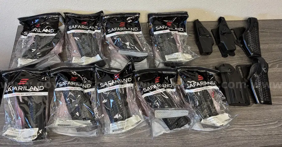 SAFARILAND HOLSTER LOT 14ea