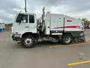 2011 NISSAN 3300 SWEEPER TRUCK