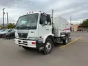 2011 NISSAN 3300 SWEEPER TRUCK