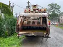 2001 Volvo Xpeditor XLL w/Leach Packer Garbage Truck