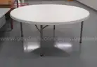 7 PLASTIC ROUND TABLES