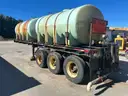 1952 Fruehauf Trailer w/ 2 qty 2,635 gal poly tanks