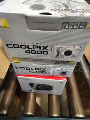 Lot of 3 Cameras - Coolpix, Canon