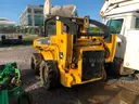JOHN DEERE FRONT END LOADER (DIESEL) SKID STEER