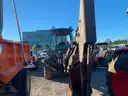 BACK HOE SCOOP LOADER