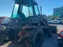 BACK HOE SCOOP LOADER