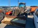 BACK HOE SCOOP LOADER