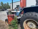 Holland Tractor with attachment (Mower Flail)