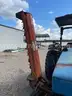 Holland Tractor with attachment (Mower Flail)