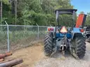 Holland Tractor with attachment (Mower Flail)
