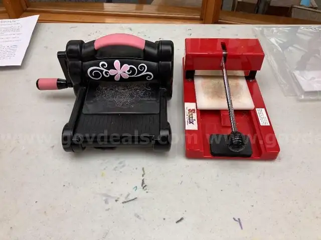 2 Die cut machines and box of die cuts