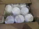 Assortment of Plastic Lids, Plates, and Plastic Bowls