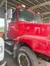 1995 White GMC roll off truck