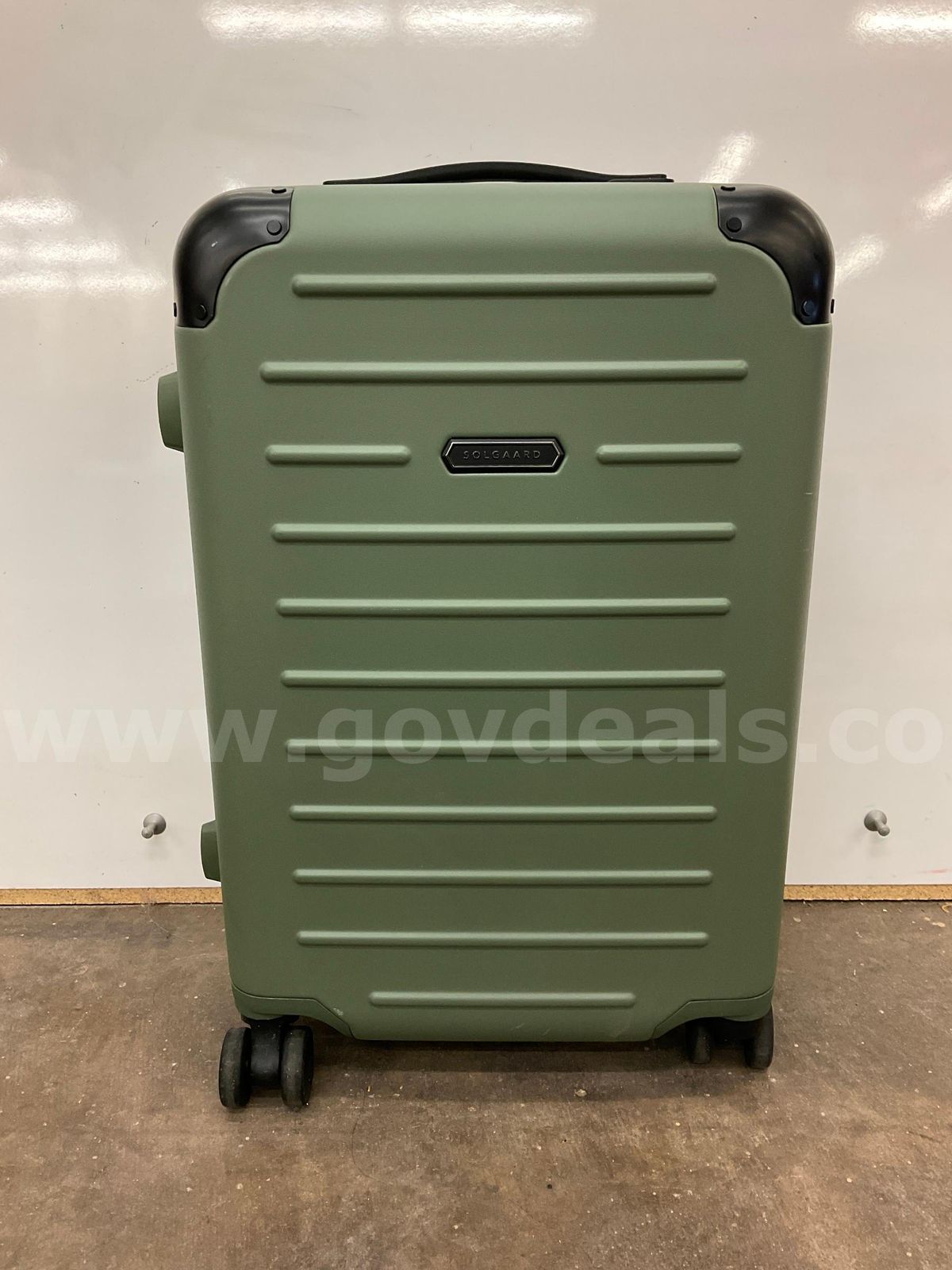 Solgaard Suitcase | AllSurplus