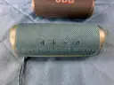 2 - JBL Bluetooth Speakers, Both Power On: 1 - Flip 5 and 1 - Flip 6